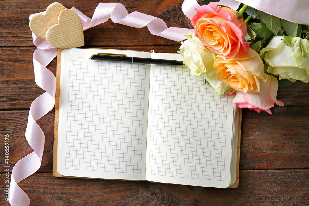 Wedding to do list with flowers on table