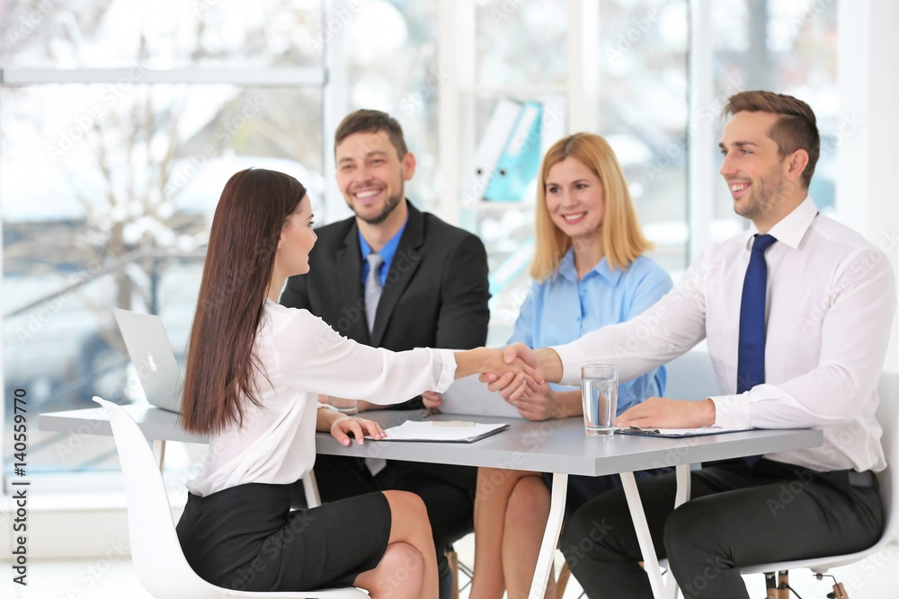 Job interview concept. Human resources commission interviewing woman