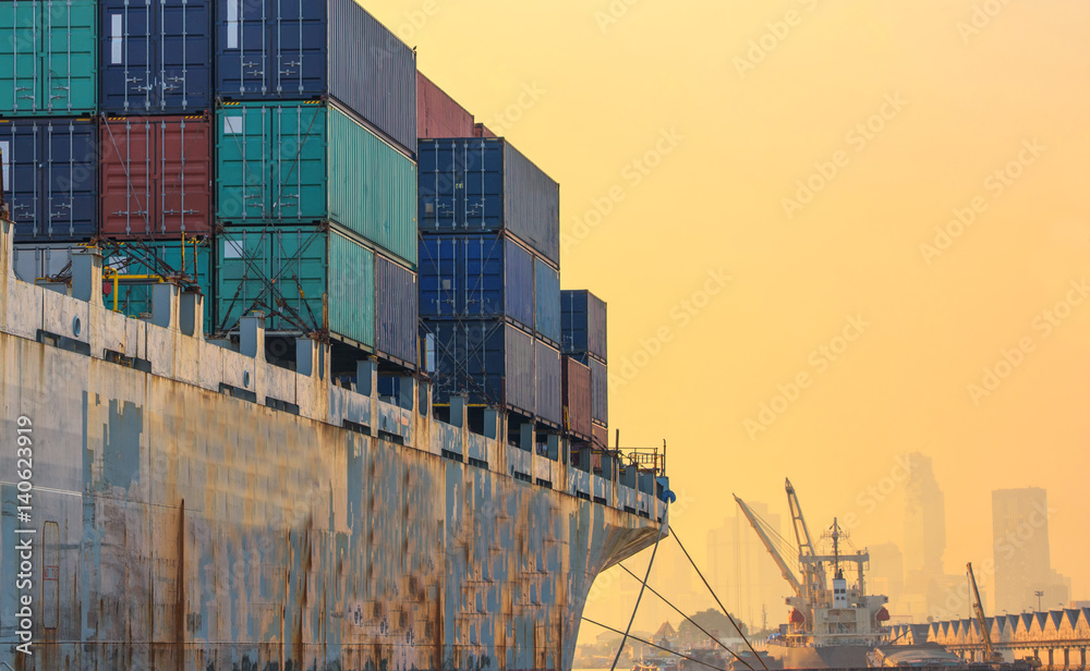 container ship in import export and business logistic.By crane ,Trade Port , Shipping.cargo to harbo