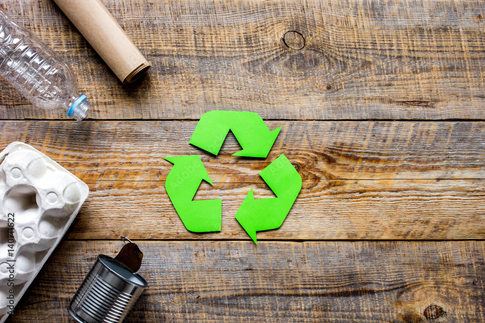 environment concept with recycling symbol on rustic background top view mockup