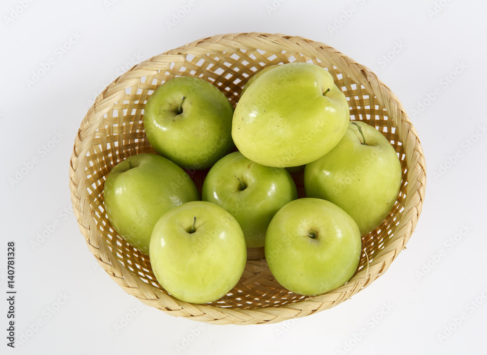 Jujube in a basket isolated on white background