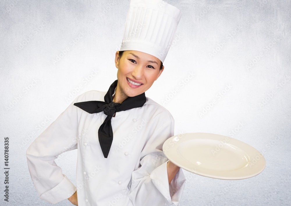 Chef with plate against white background