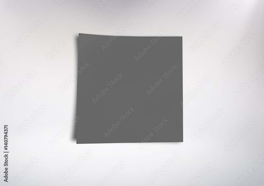 Grey sticky Note against grey neutral background