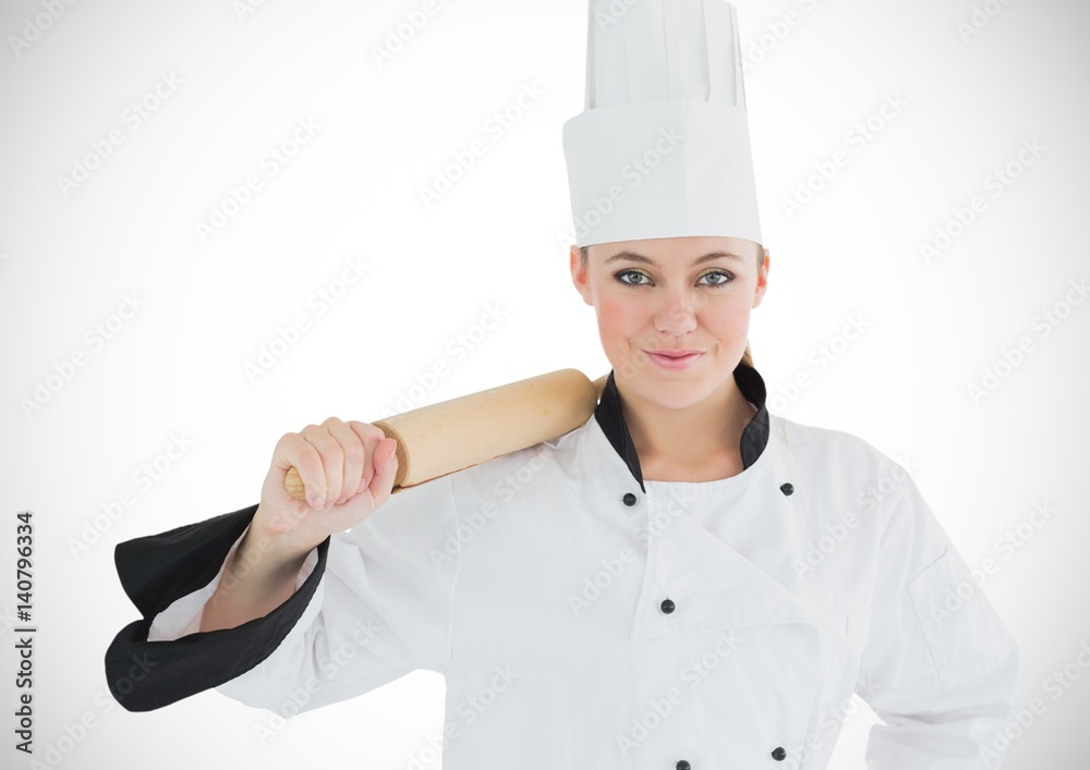 Chef with rolling pin against white background