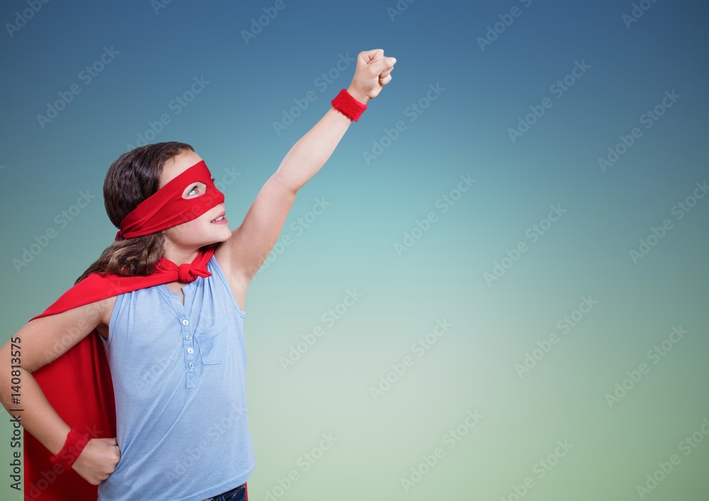 Girl in superhero costume pretending to fly