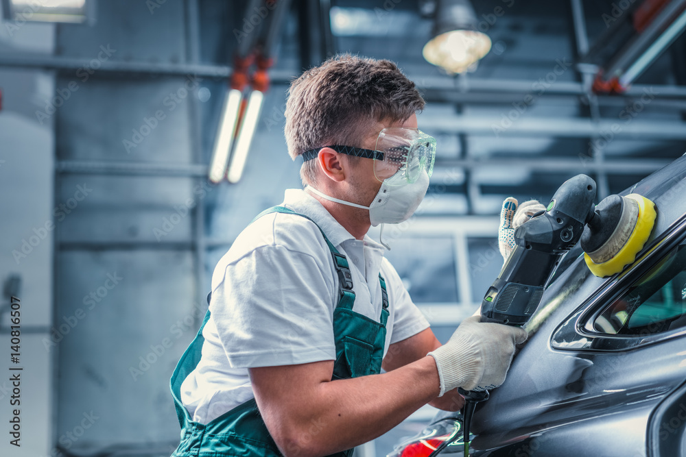 Worker in overalls