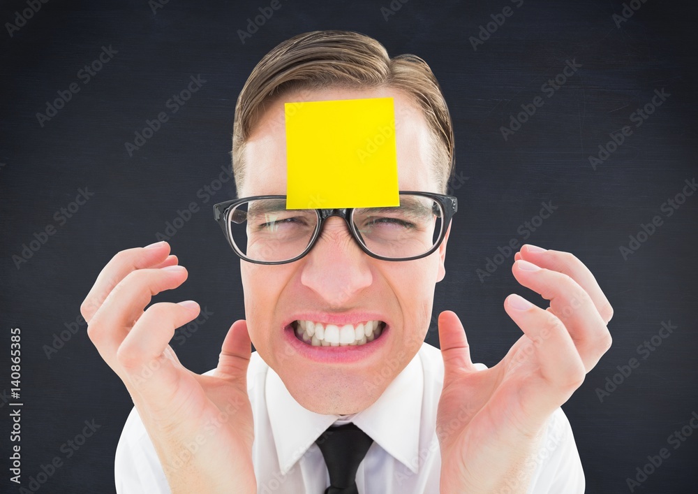 Frustrated man with blank sticky note on forehead