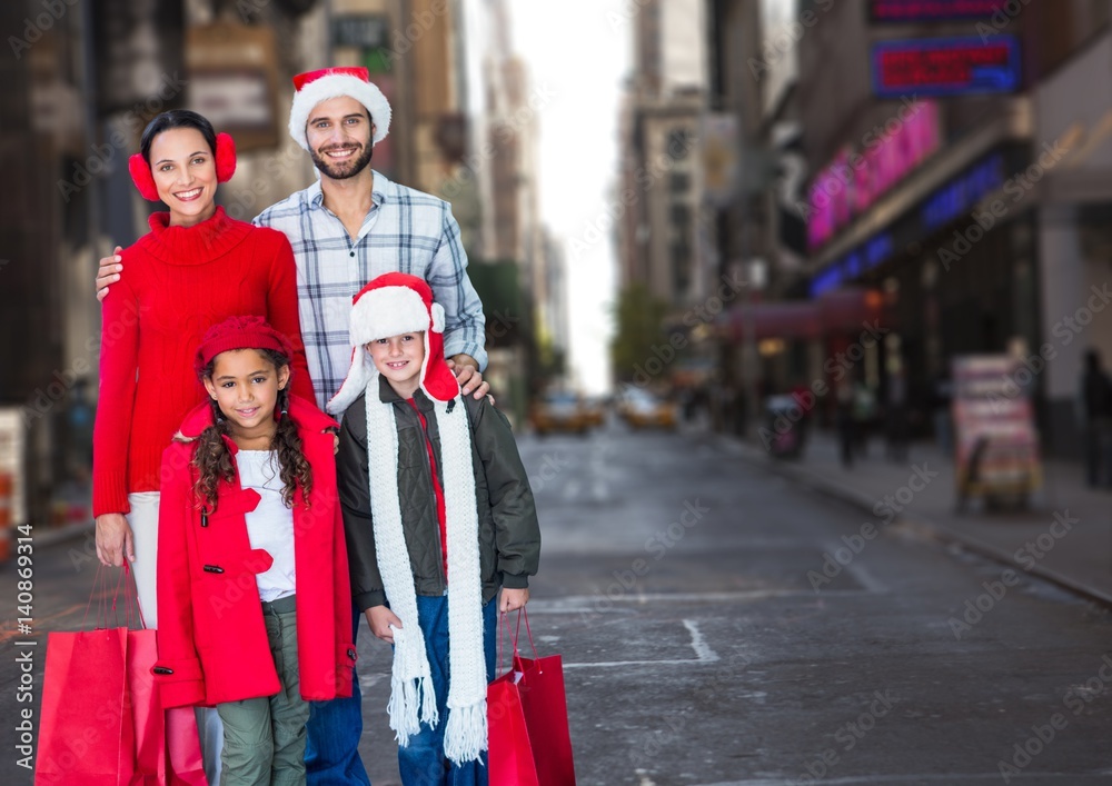 Happy family standing together on road