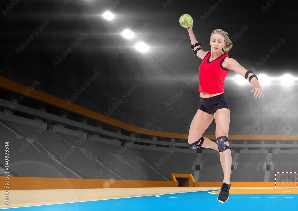 Female athlete playing handball in stadium