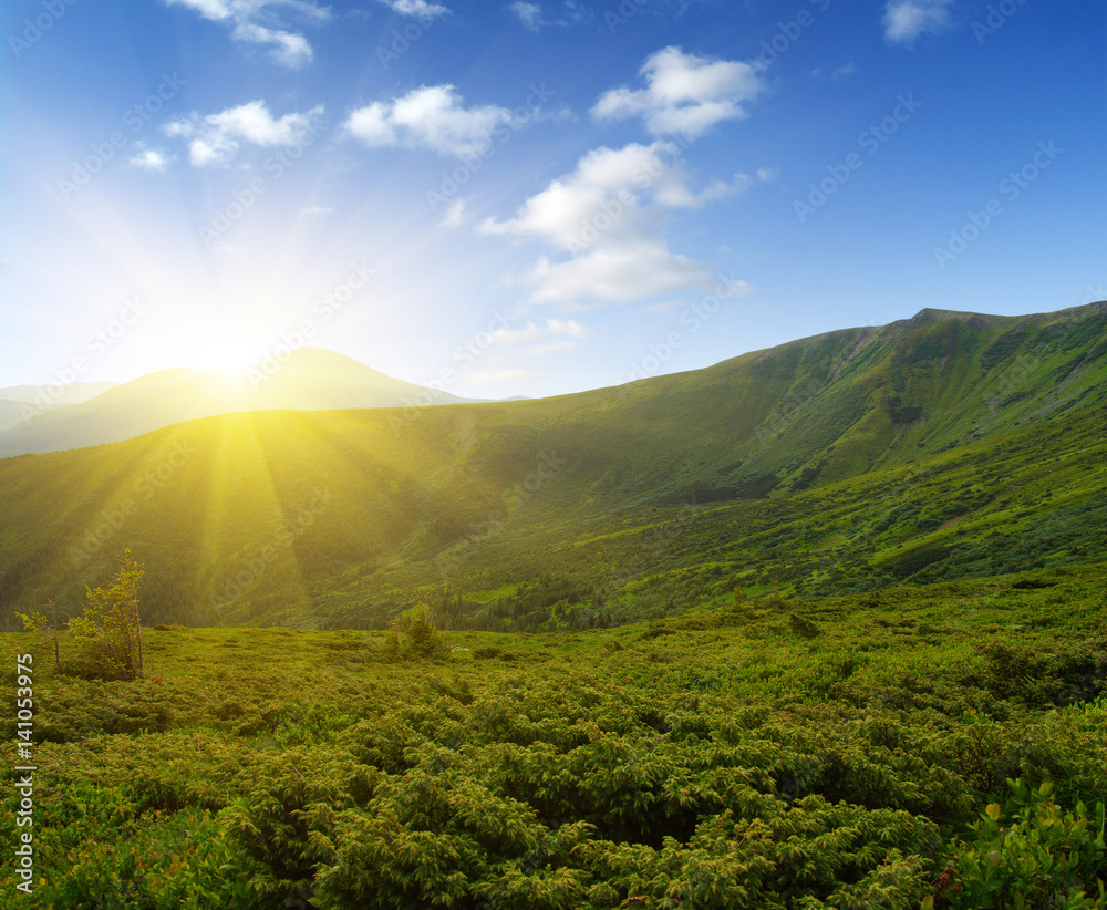 Mountain landscape on sun