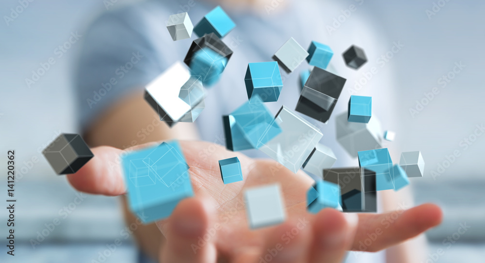 Businessman holding floating blue shiny cube network 3D rendering