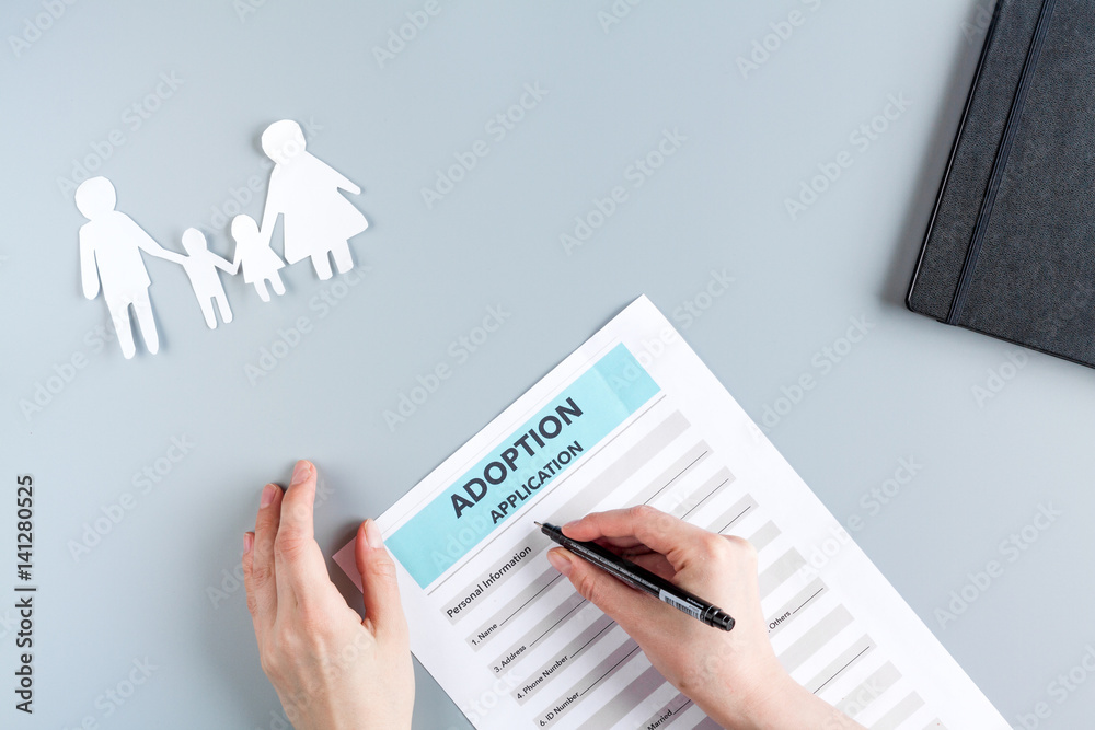 adoption form in family concept on gray background top view mock-up