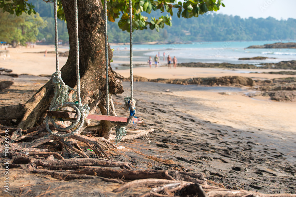 Swing hanging under the tree at Rang Yai island, Phuket, Thailand