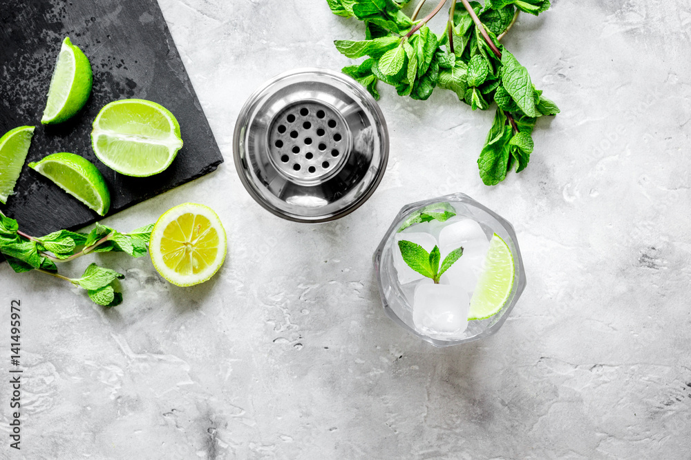 making mojito on stone background top view