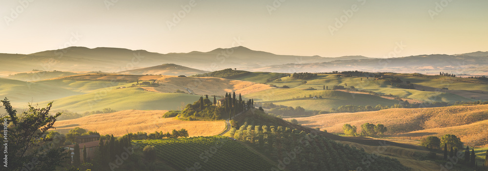 Scenic Tuscany landscape panorama at sunrise, Val dOrcia, Italy