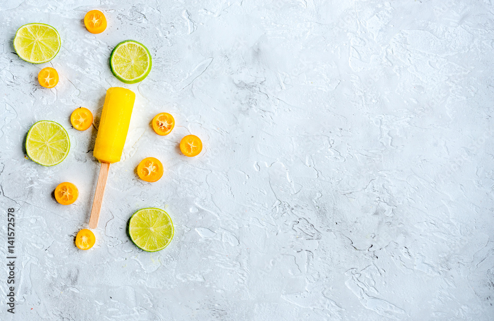 Orange icecream with fruits on table background top view mock-up