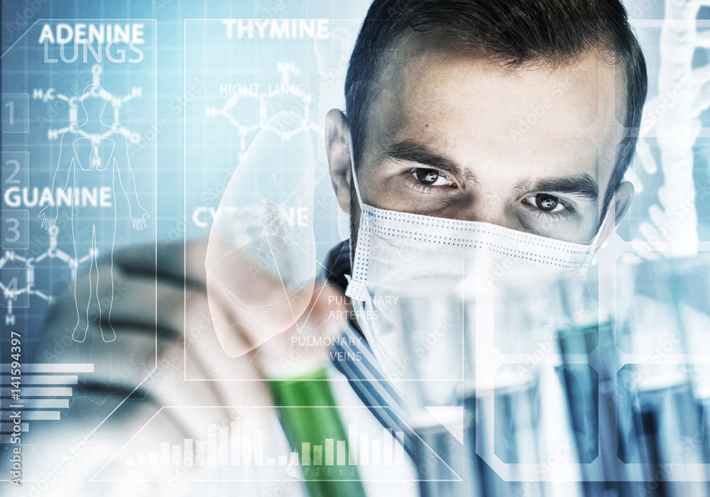 Portrait of concentrated male scientist working with reagents in laboratory