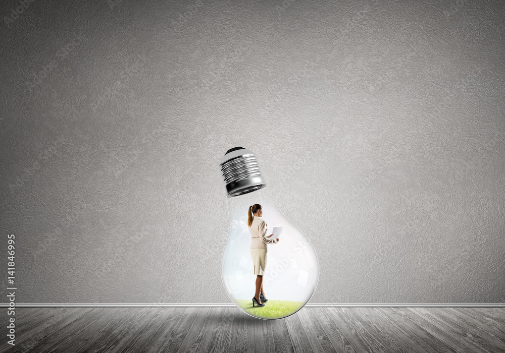 Businesswoman trapped in bulb