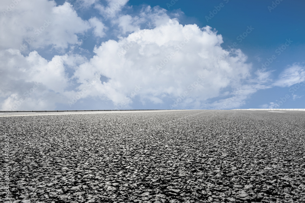 Asphalt road and blue sky