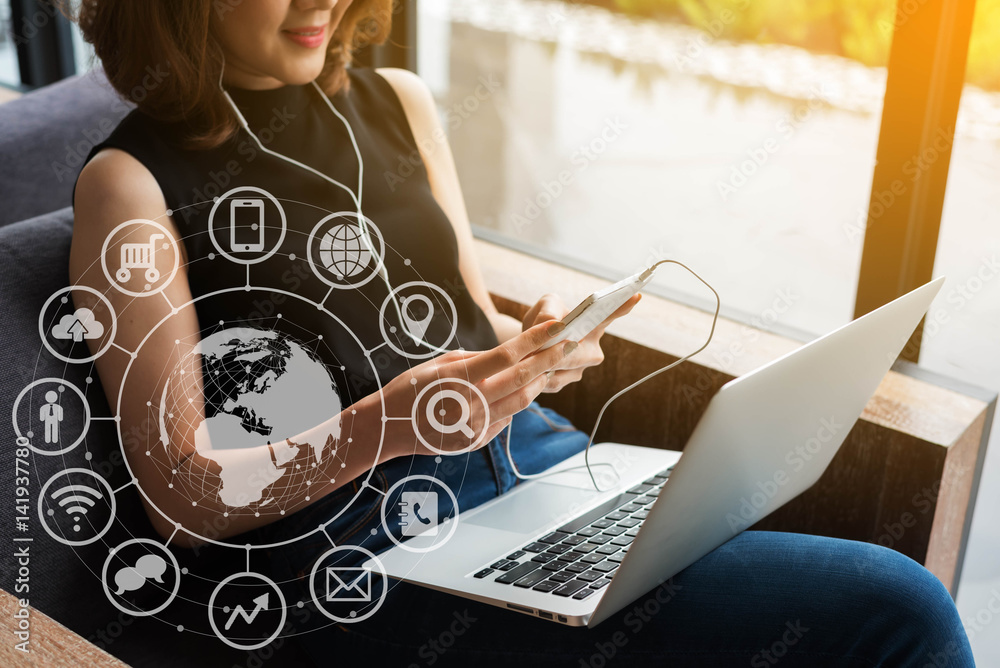 Woman use smartphone and laptop, internet of things conceptual, globalization omni channel communica