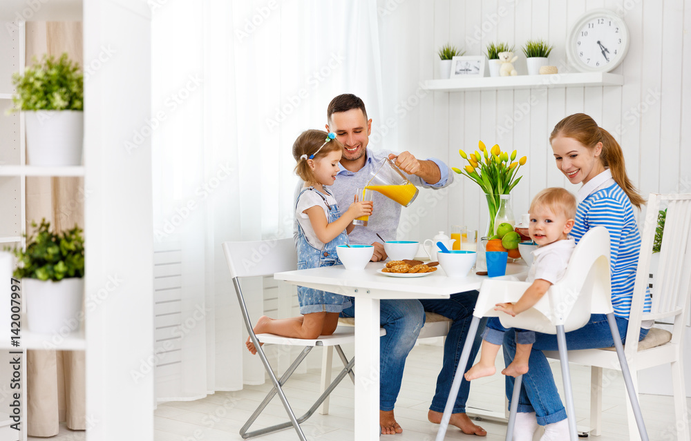 Happy family  at breakfast