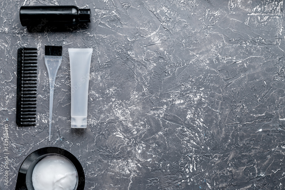 Tools for hair dye in barbershop on gray background top view mock-up