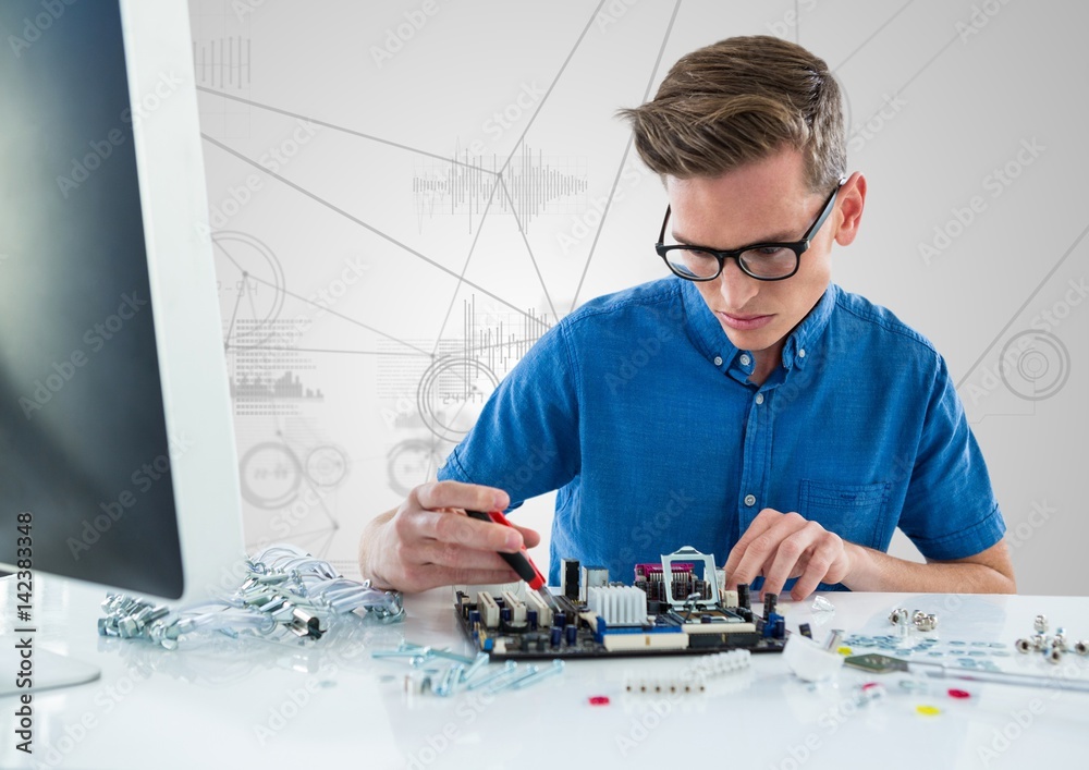 Man with electronics against white background with graphs