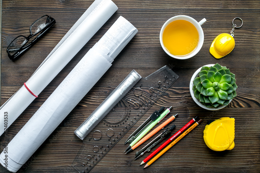 Architects workplace with tools on wooden background top view