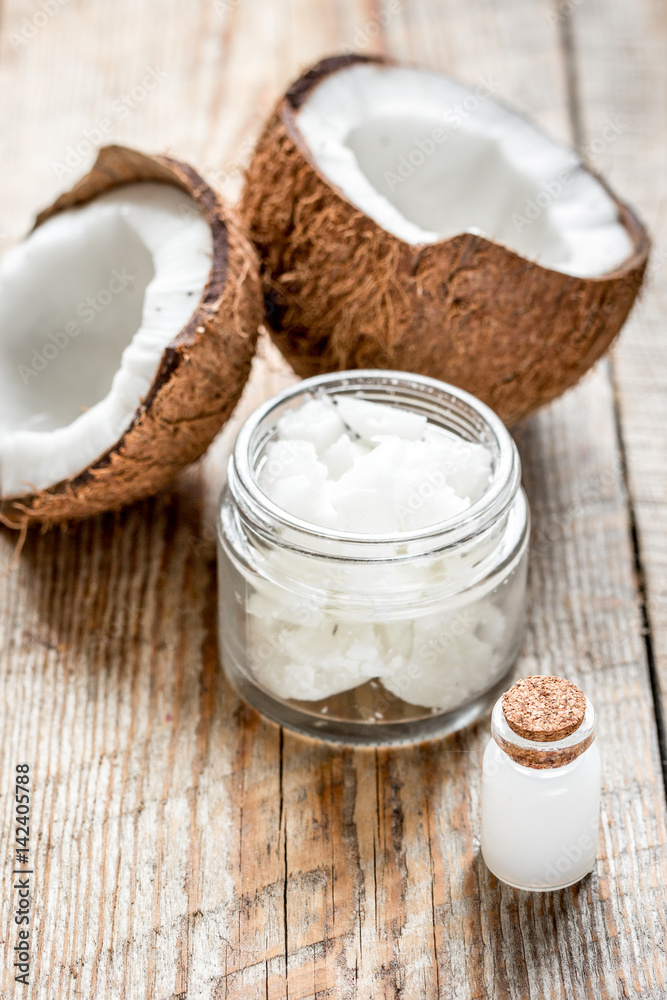 organic cosmetics concept with coconut on table background