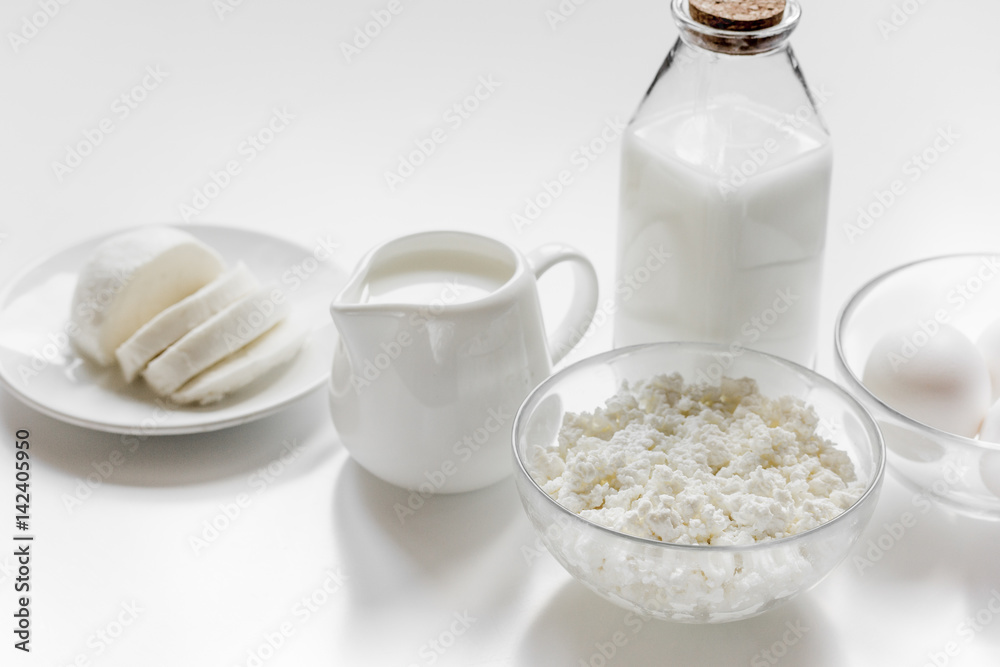 dairy products for proteic meal on white table background