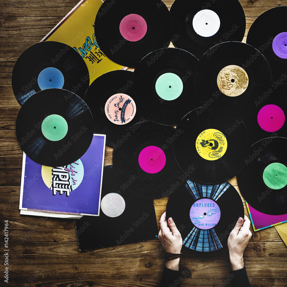 Hands with Vinyl Record Player Music