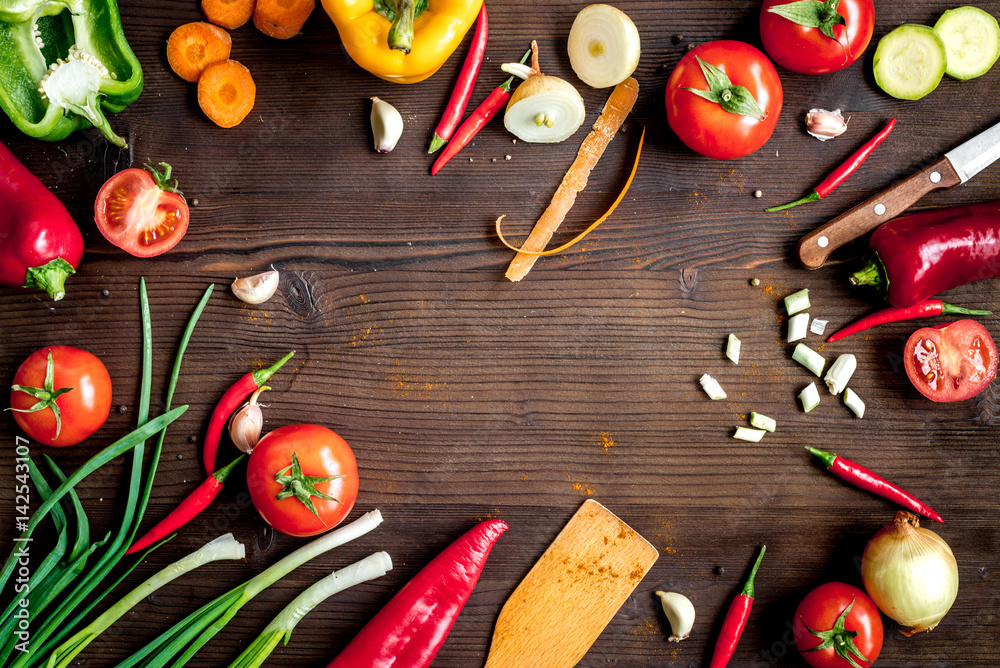 ingredients for vegetable ragout on wooden background top view