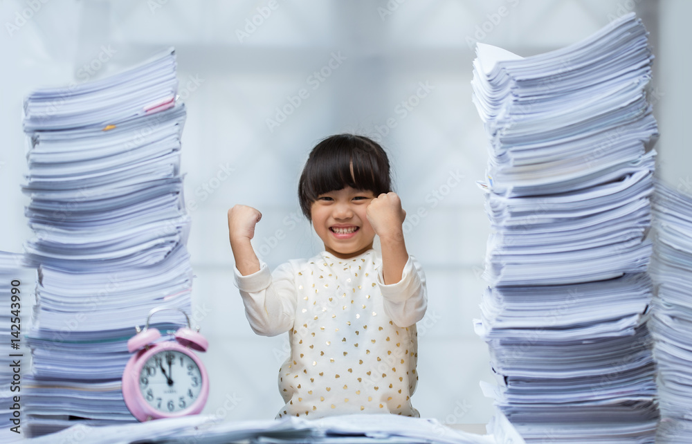 Happy little girl and early education. little kids doing his homework for fun and learning