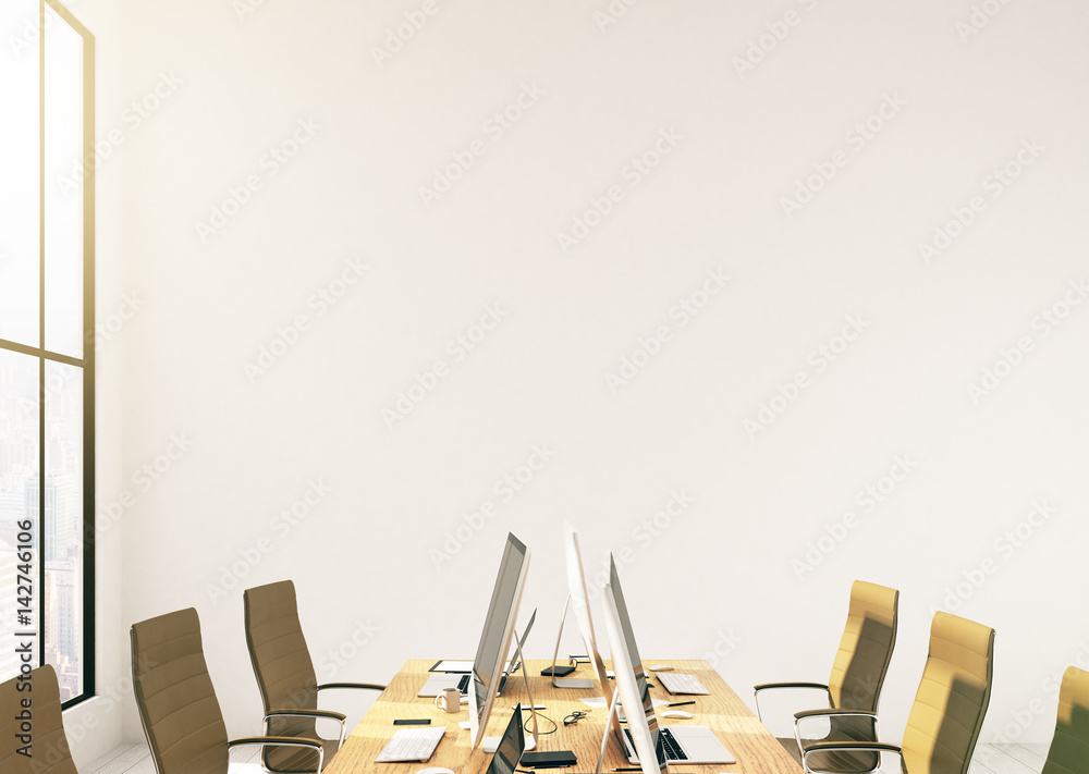 Conference room with blank wall