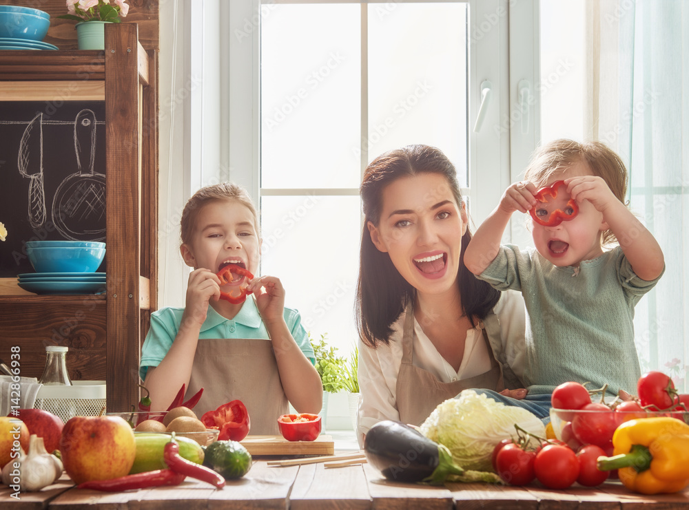 Happy family in the kitchen.