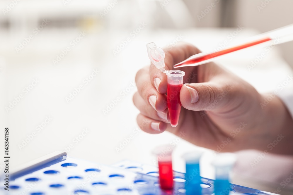 Hand researcher with glass.