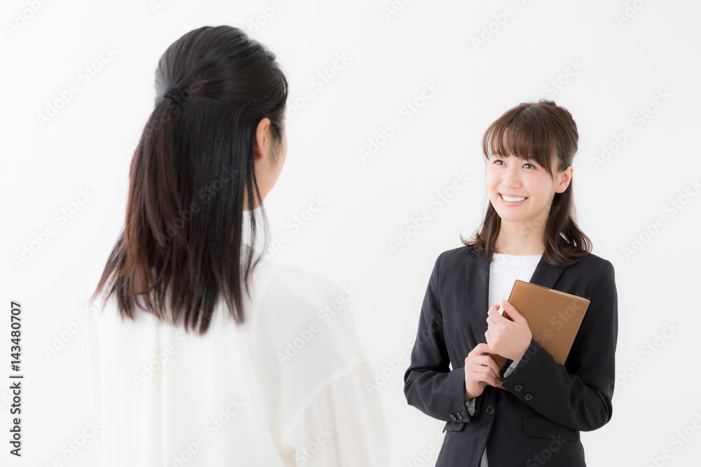 asian businesswomen talking on white background