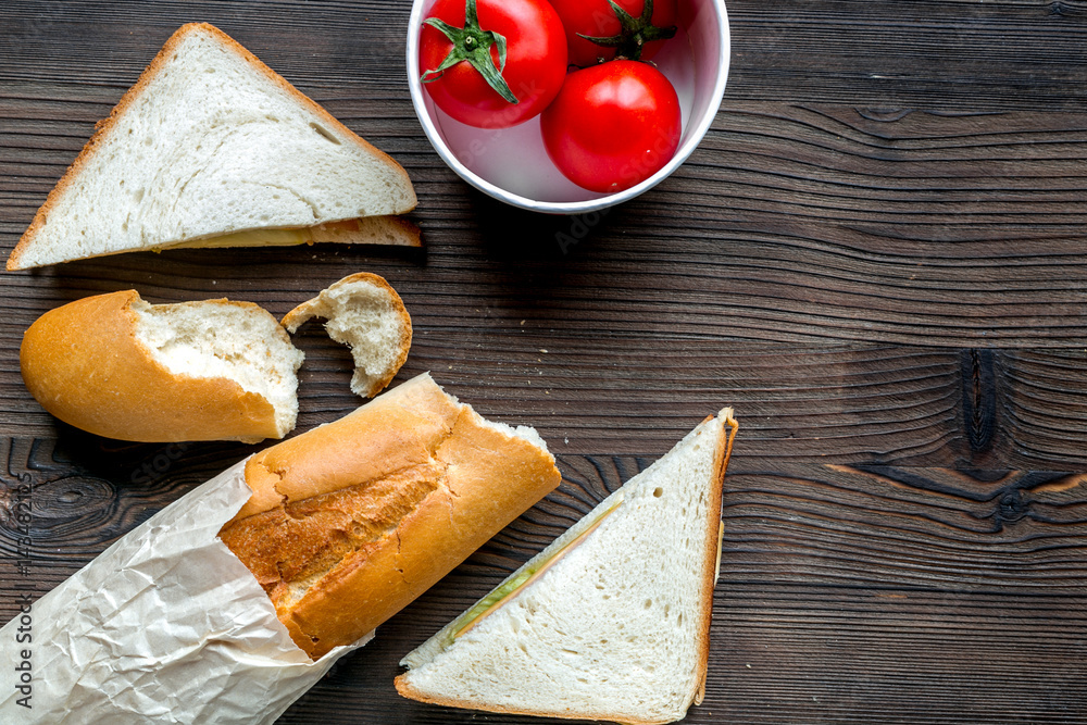 bread and vegetables on wooden desk background top view mock-up