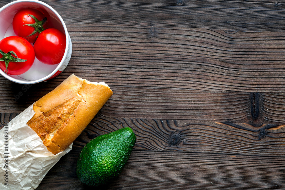 food set with vegetables and bread on table background top view mock-up