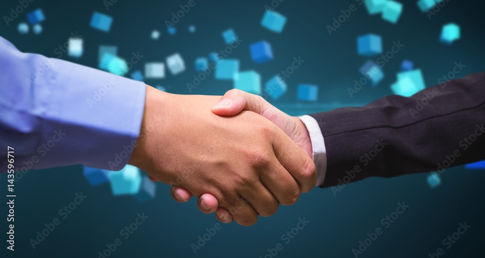 Composite image of businessmen shaking hands