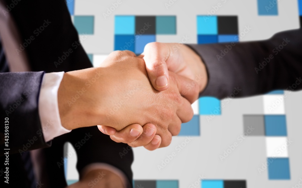 Composite image of male and female corporates shaking hands