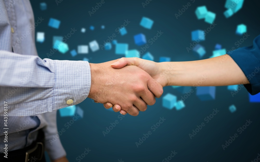 Composite image of male and female collegues shaking hands