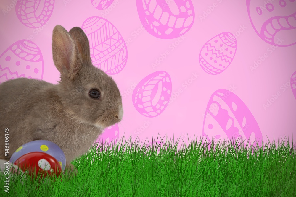 Composite image of bunny with polka dot easter eggs