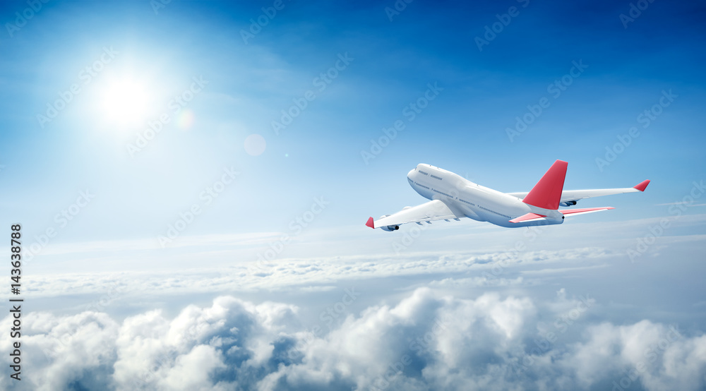 Airplane flying above clouds