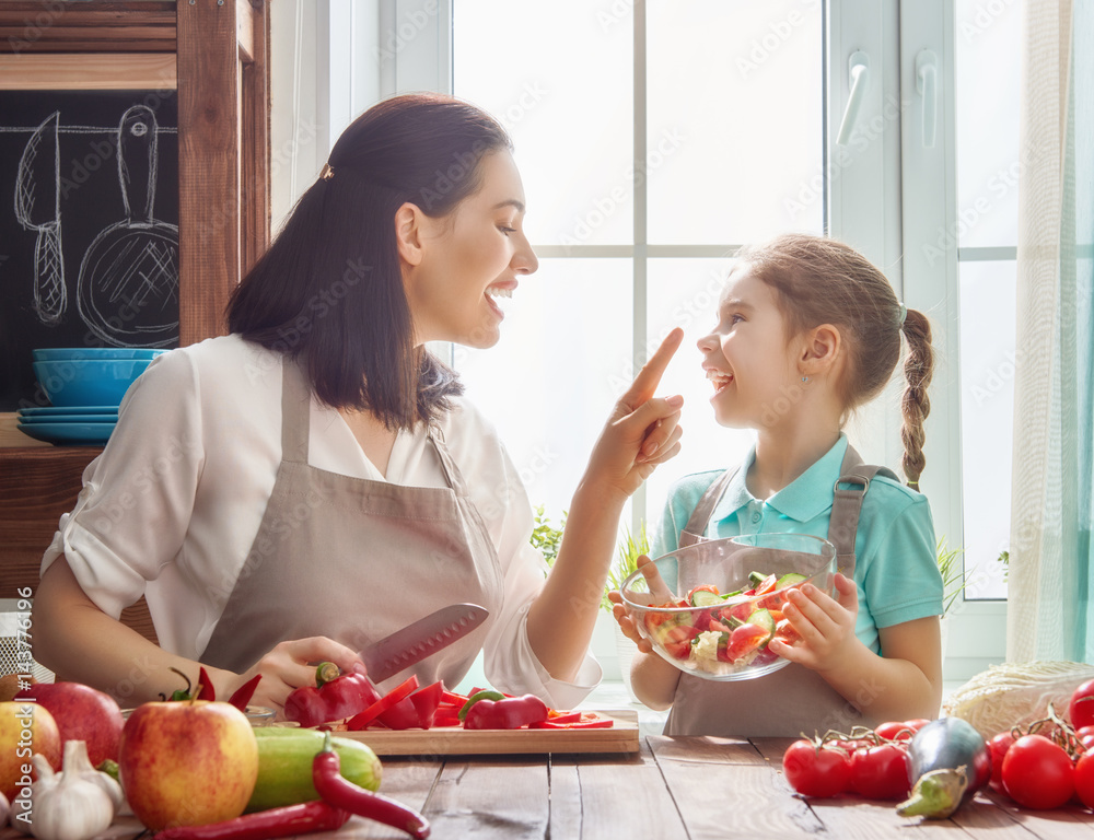 Happy family in the kitchen.