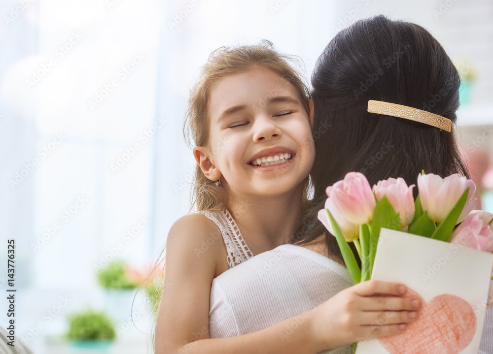 daughter congratulates mom