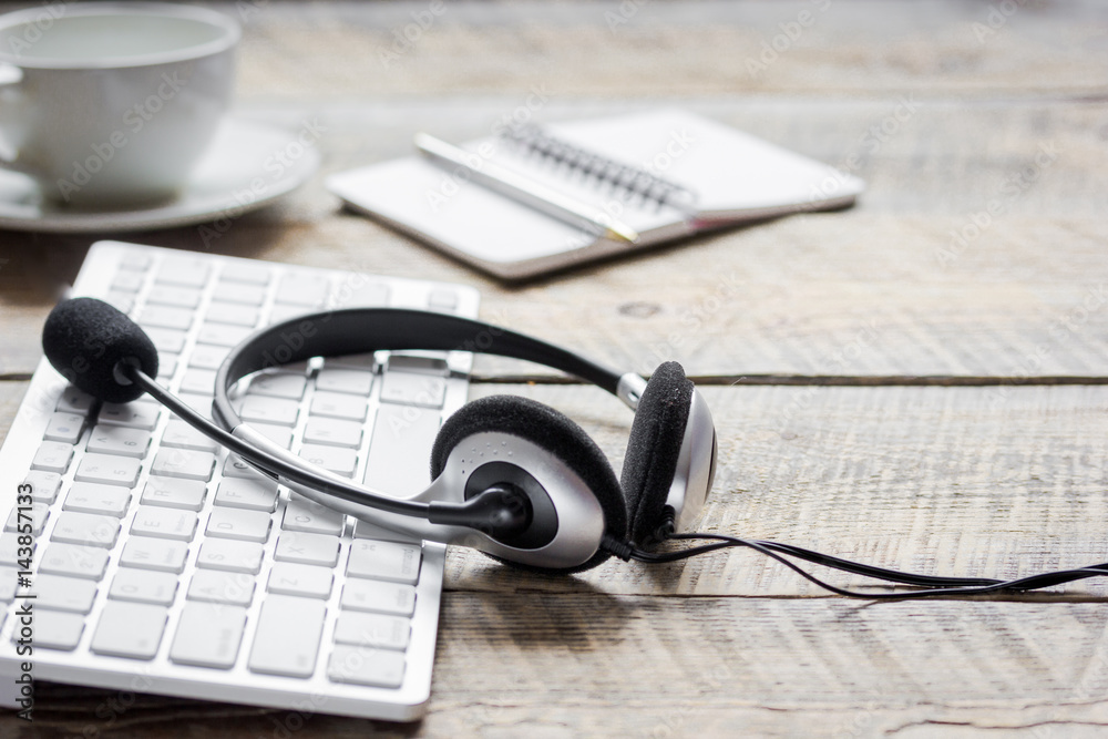 profession concept with headset of call center manager