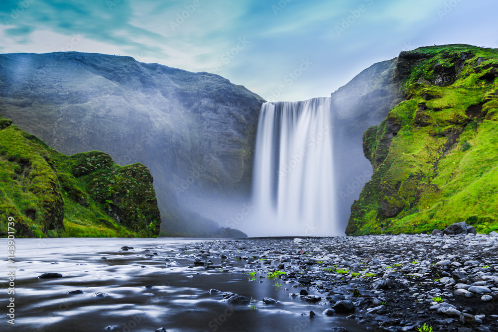 Skogafoss waterfall in mystic twilight, Iceland