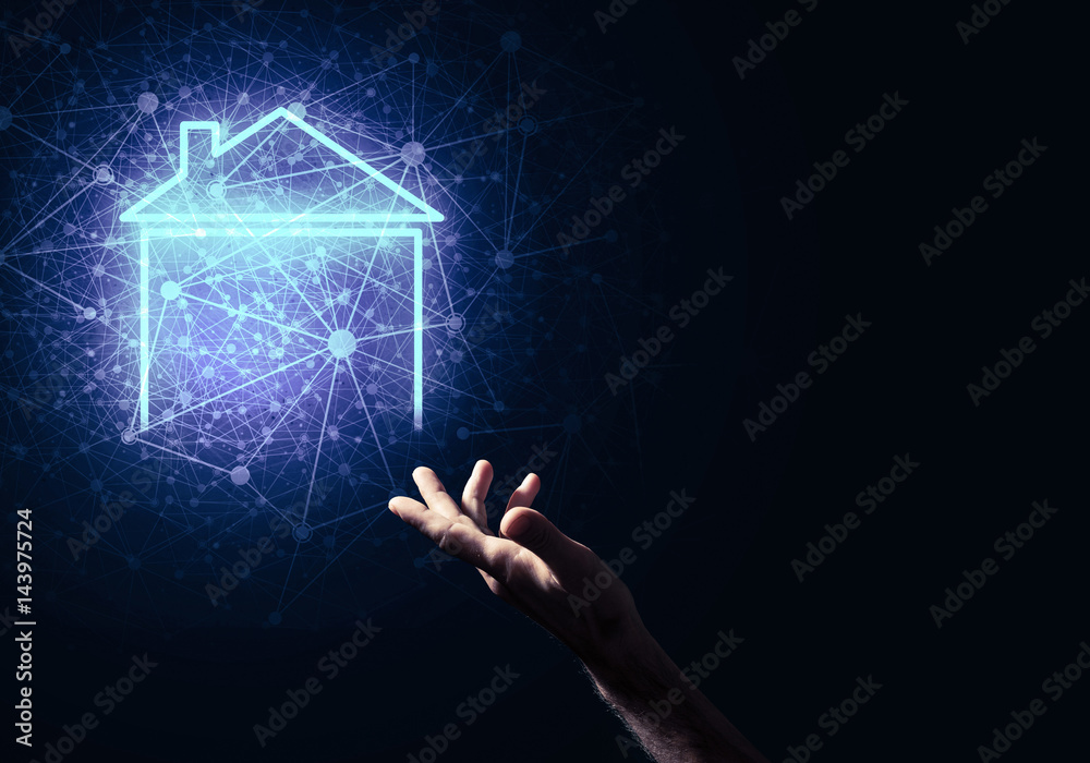 Conceptual image with hand pointing at house or main page icon o