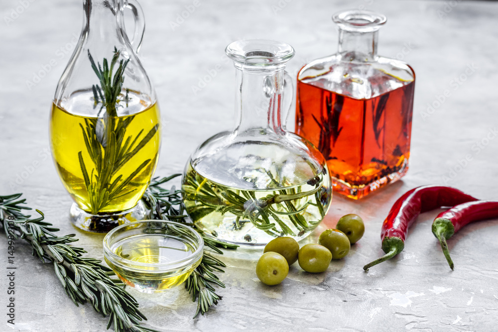 natural oils concept with fresh olives and chili paper on table background